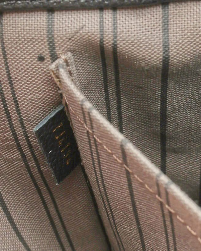 Louis Vuitton Monogram Empreinte Montaigne MM Bag