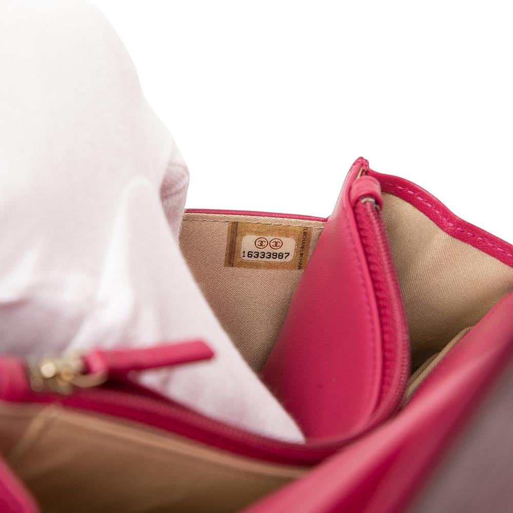 Chanel Pink Dark Pink Lambskin Leather Leather CC Embossed Lambskin Camellia Wallet On Chain France