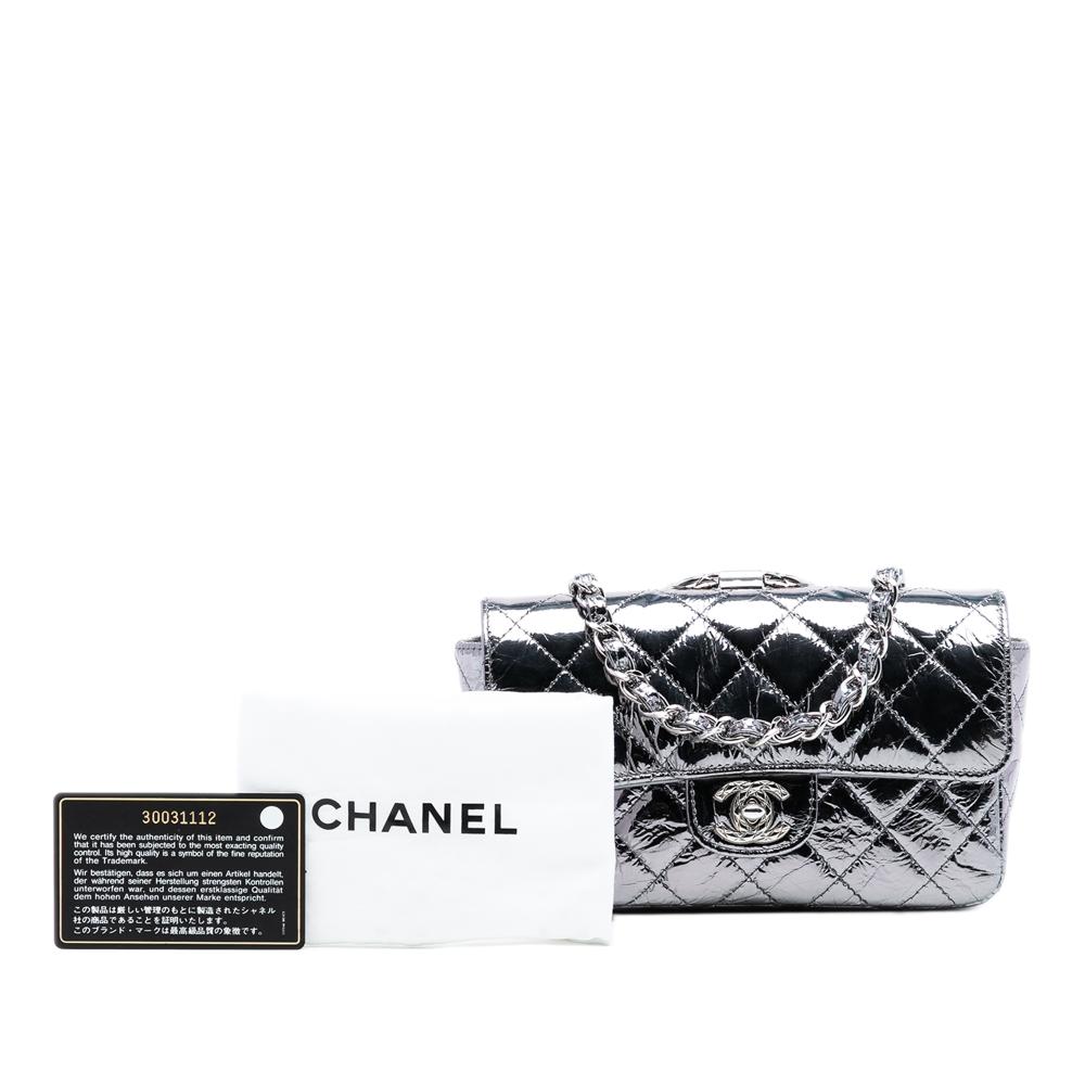 Chanel AB Chanel Silver Calf Leather Mini Quilted Metallic skin Ring Top Handle Flap France