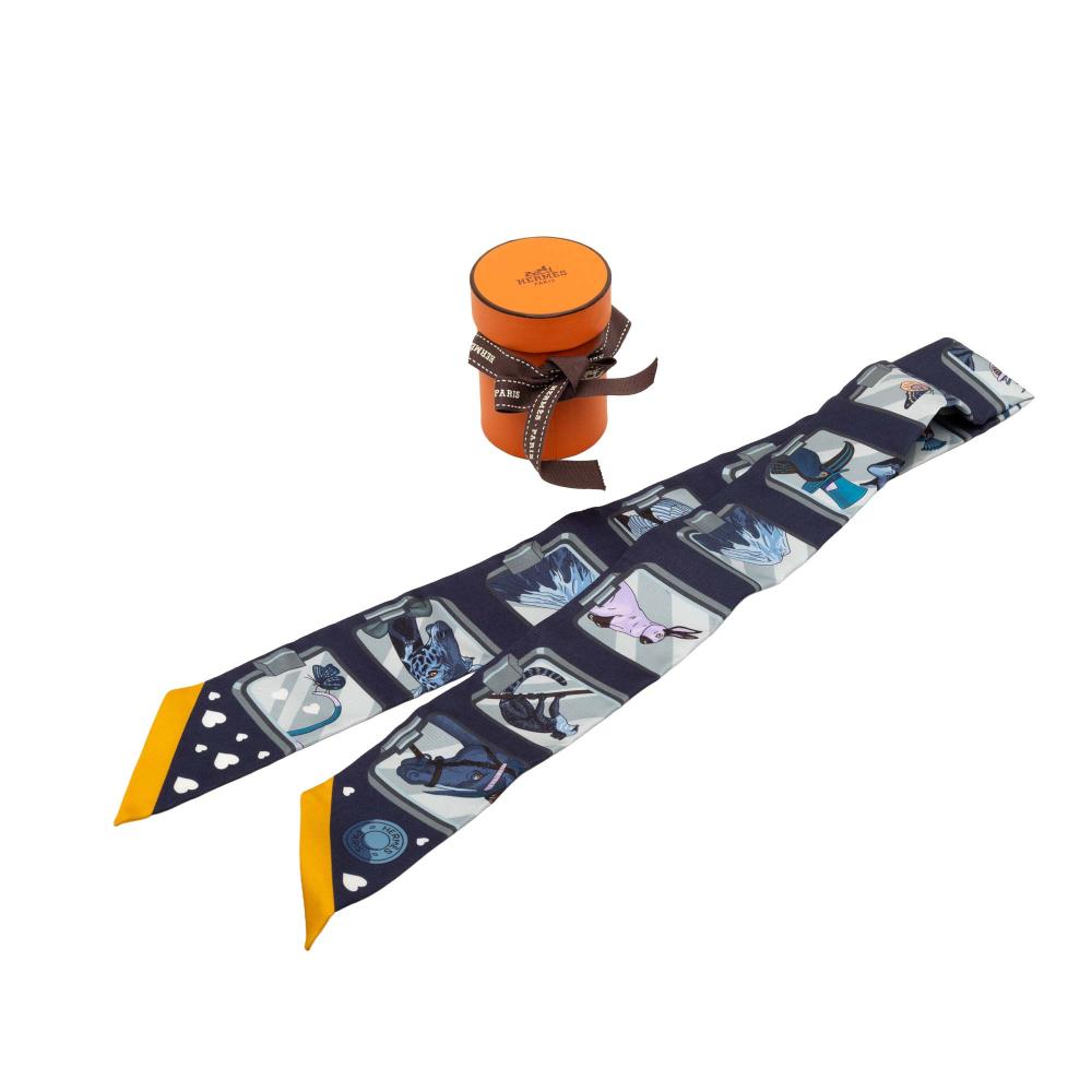 Hermès AB Hermès Blue Navy with Gold Silk Fabric Story Twilly Scarf France