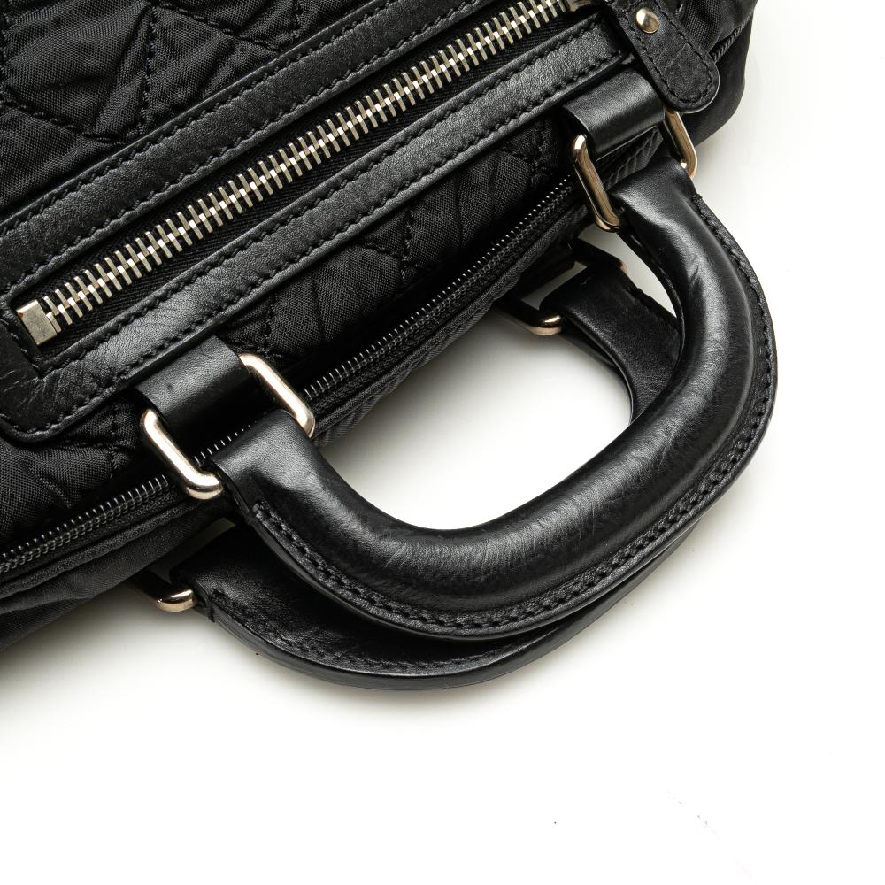 Chanel B Chanel Black Nylon Fabric Paris New York Quilted Duffle Handbag Italy