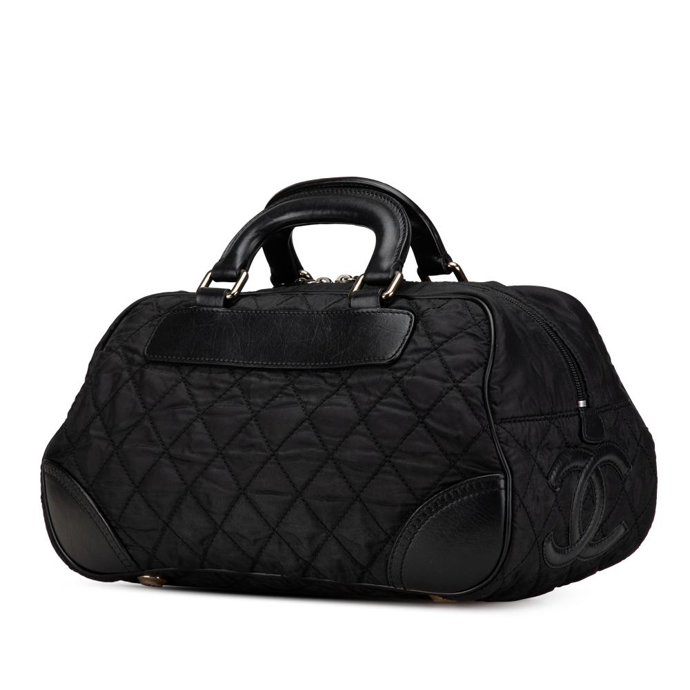 Chanel B Chanel Black Nylon Fabric Paris New York Quilted Duffle Handbag Italy