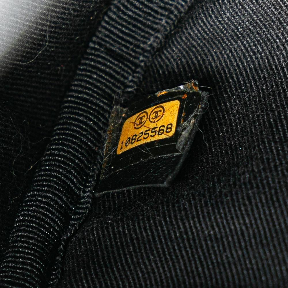 Chanel B Chanel Black Nylon Fabric Paris New York Quilted Duffle Handbag Italy