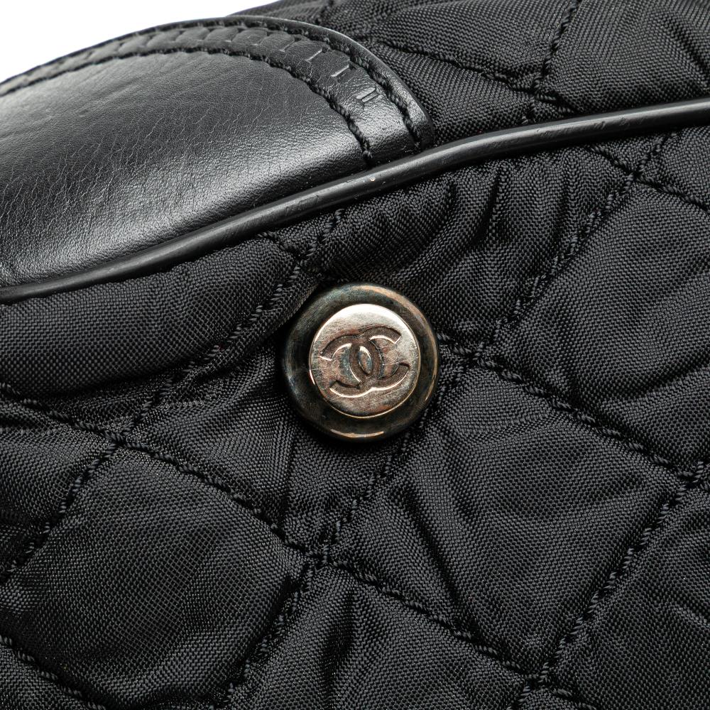 Chanel B Chanel Black Nylon Fabric Paris New York Quilted Duffle Handbag Italy