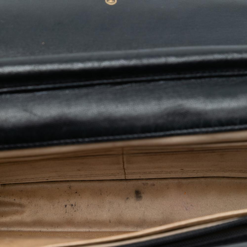 Chanel B Chanel Black Lambskin Leather Leather CC Embossed Lambskin Camellia Wallet On Chain France