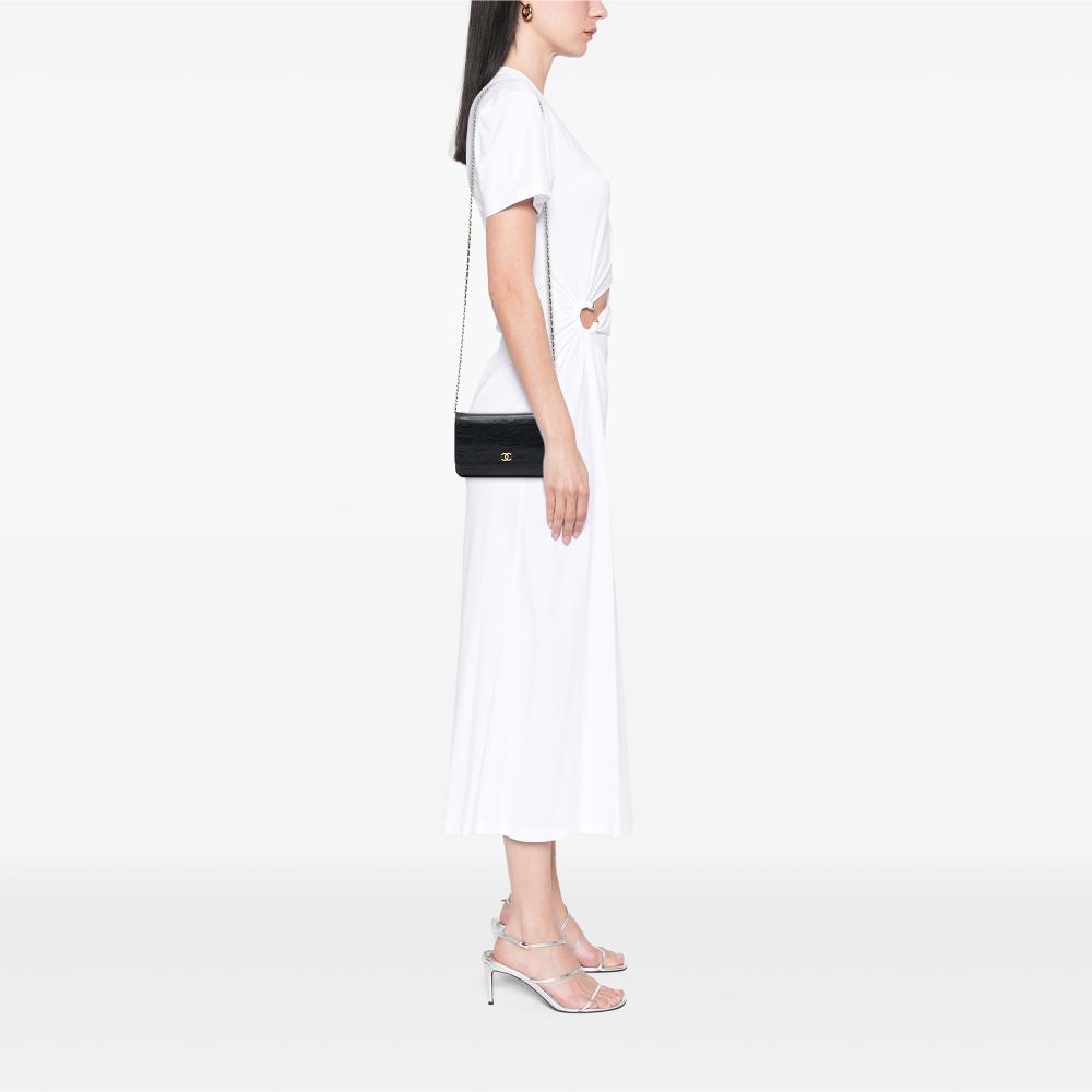 Chanel B Chanel Black Lambskin Leather Leather CC Embossed Lambskin Camellia Wallet On Chain France