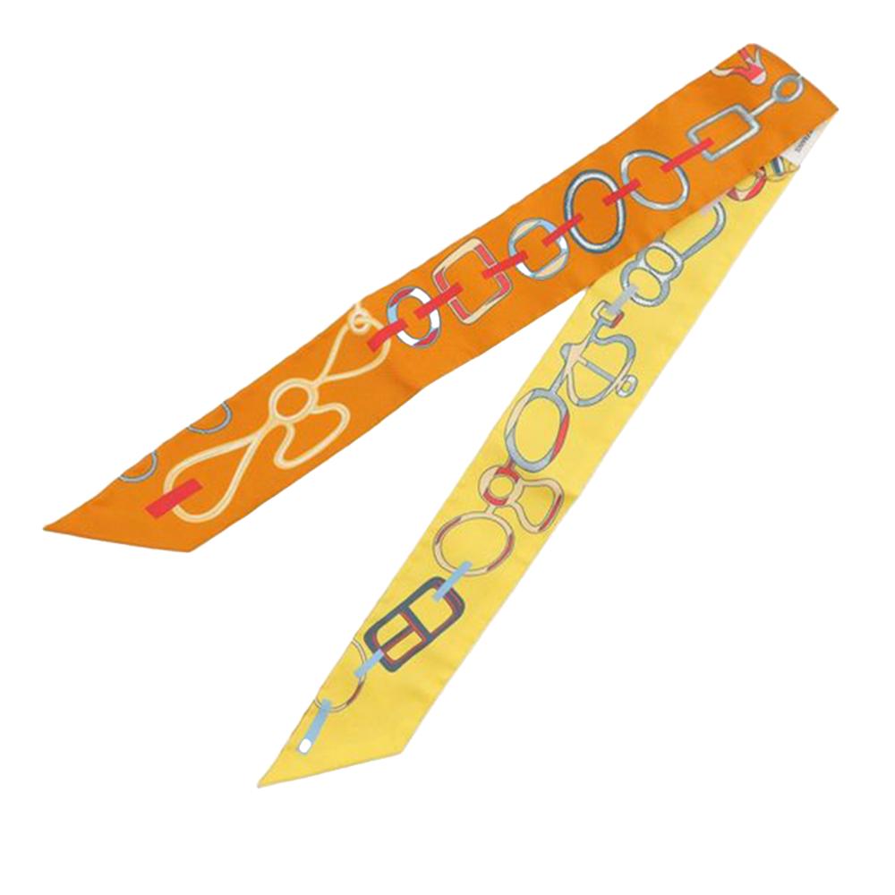 Hermès A Hermès Orange Silk Fabric Do Re Boucles Twilly Scarf France