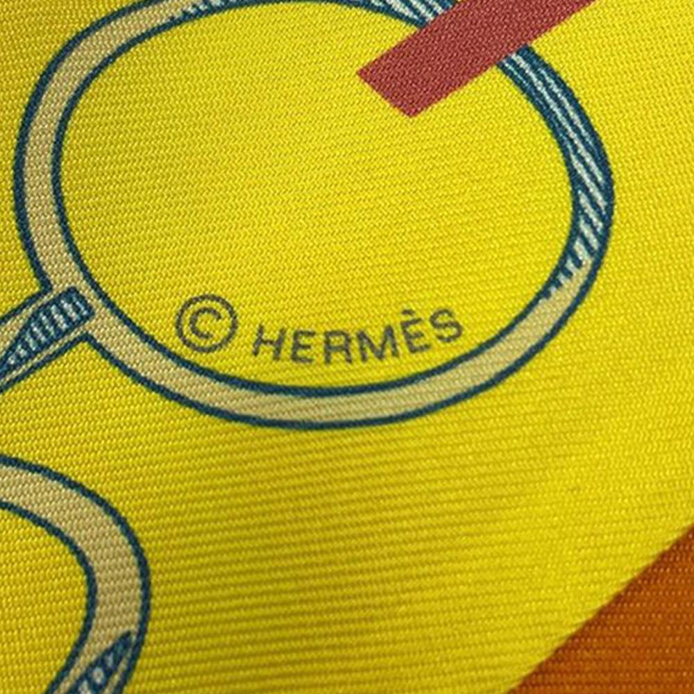 Hermès A Hermès Orange Silk Fabric Do Re Boucles Twilly Scarf France