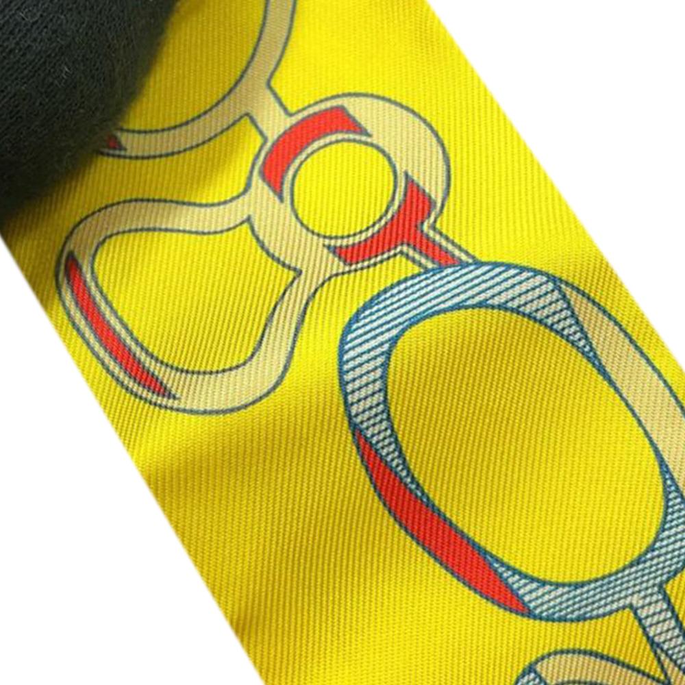 Hermès A Hermès Orange Silk Fabric Do Re Boucles Twilly Scarf France