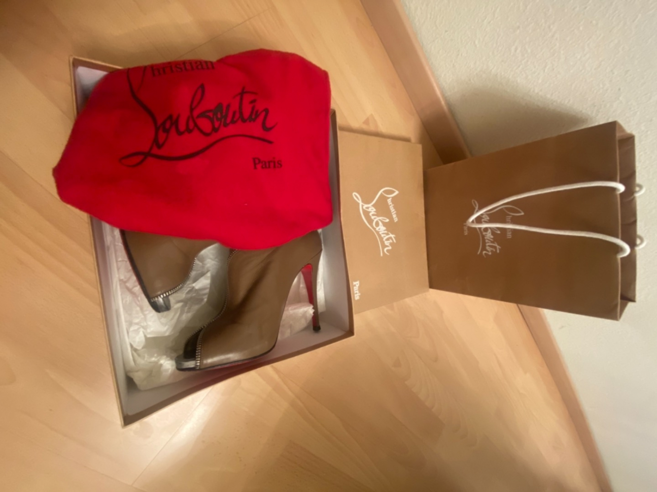 Christian Louboutin Bottes à la cheville Col Zippe