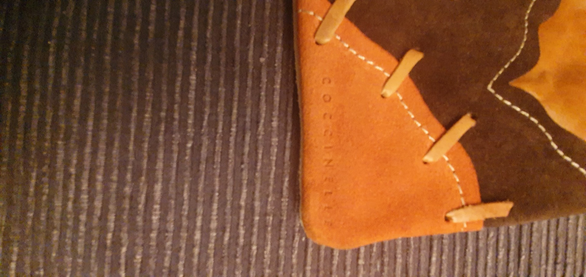 Coccinelle pochette en cuir et daim