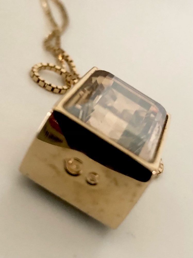 Swarovski Collier avec pendentif double face.