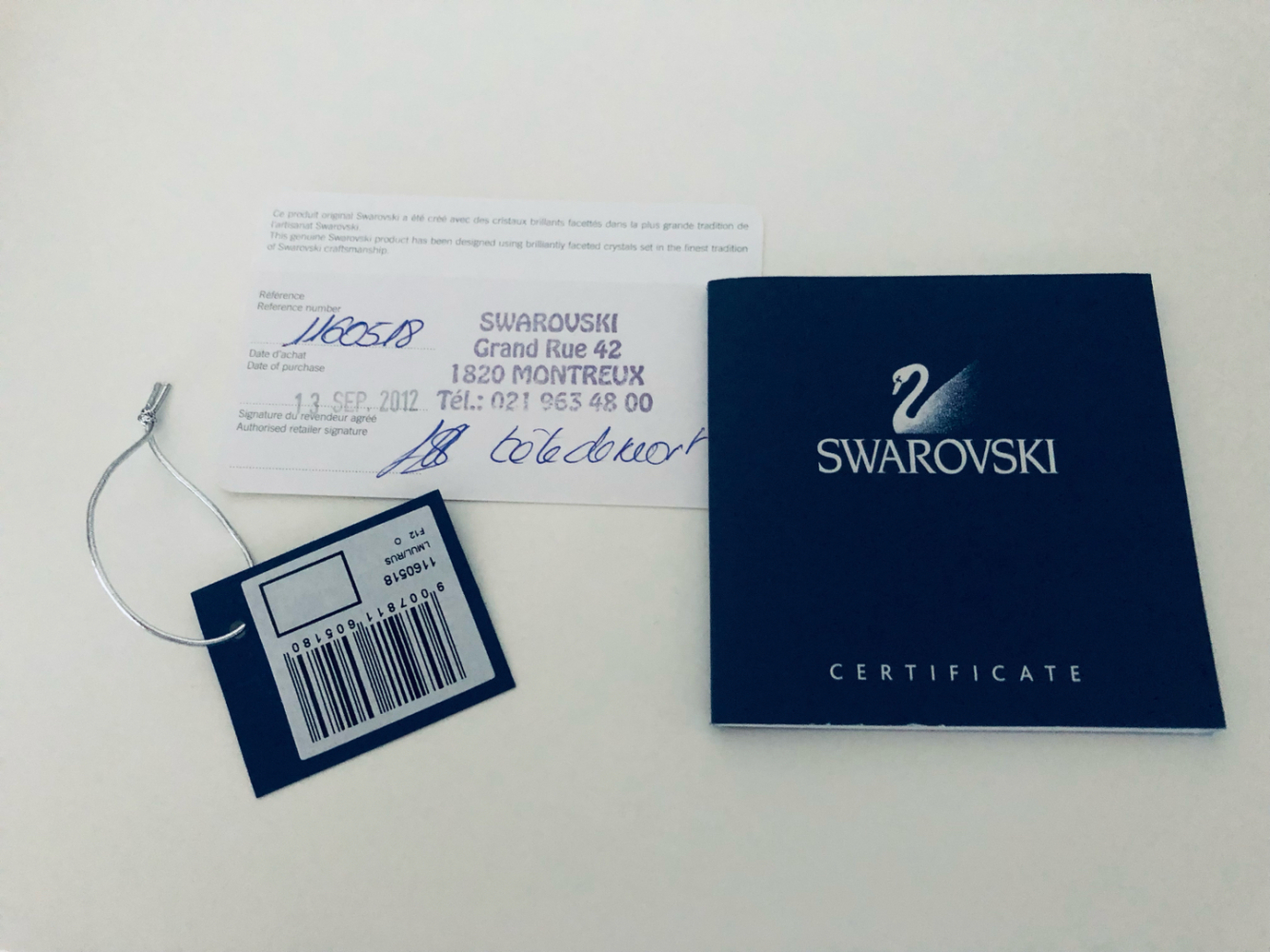 Swarovski Collier avec pendentif double face.