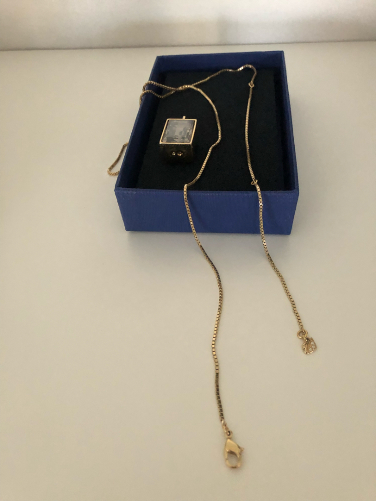 Swarovski Collier avec pendentif double face.