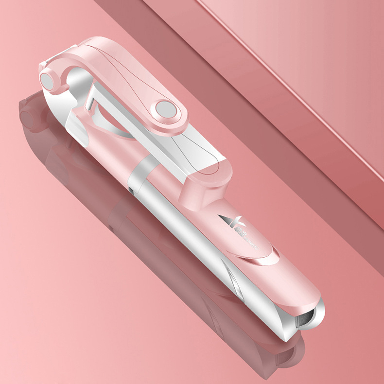 Retractable Bluetooth selfie stick with built-in tripod - Pink