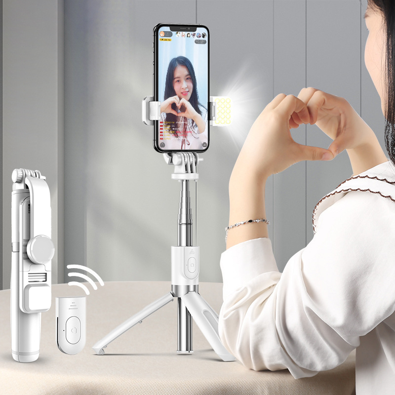 Mini foldable tripod Bluetooth self-adhesive stick with remote control and fill light shutter for iOS and Android - White